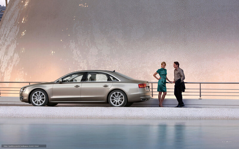 Audi A8 by a modern structure