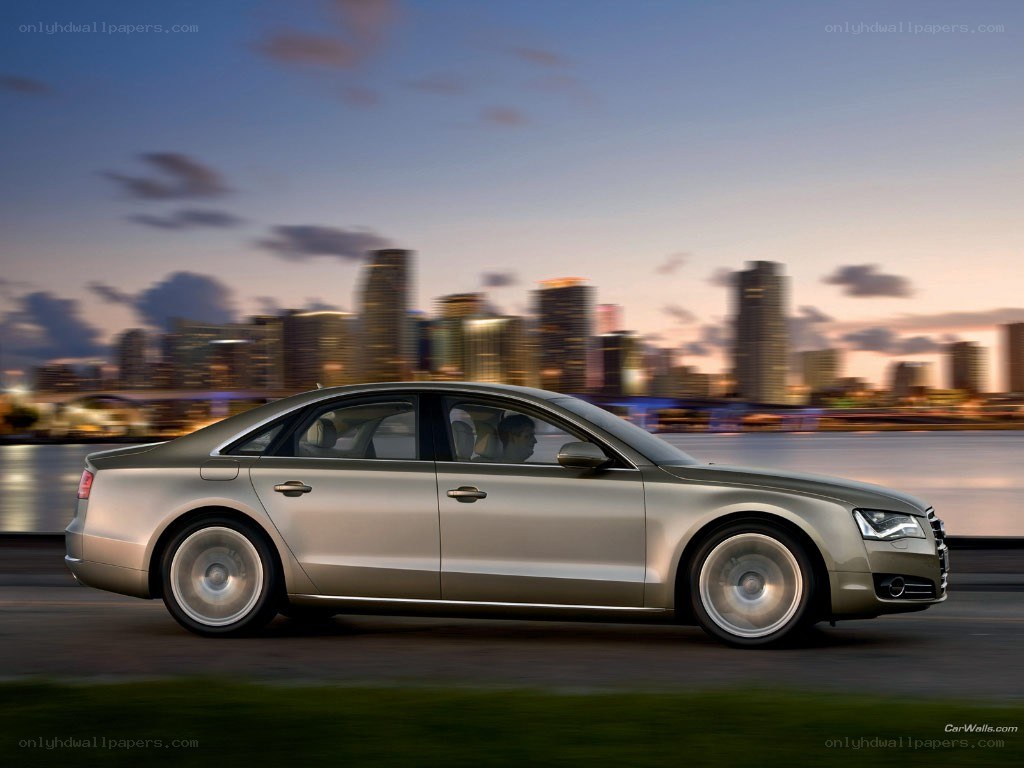 Audi A8 driving at dusk