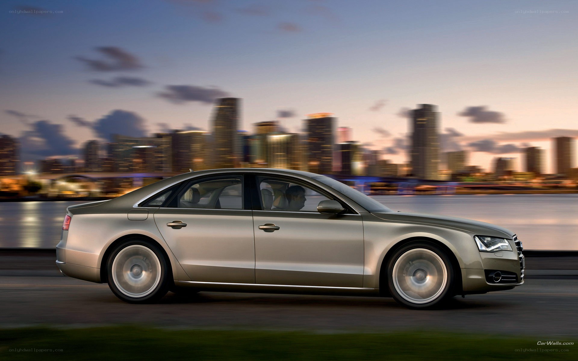 Audi A8 driving at dusk