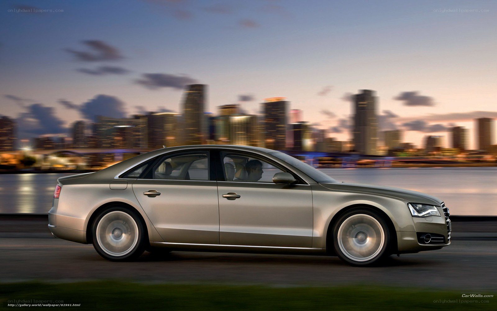 Audi A8 driving at dusk