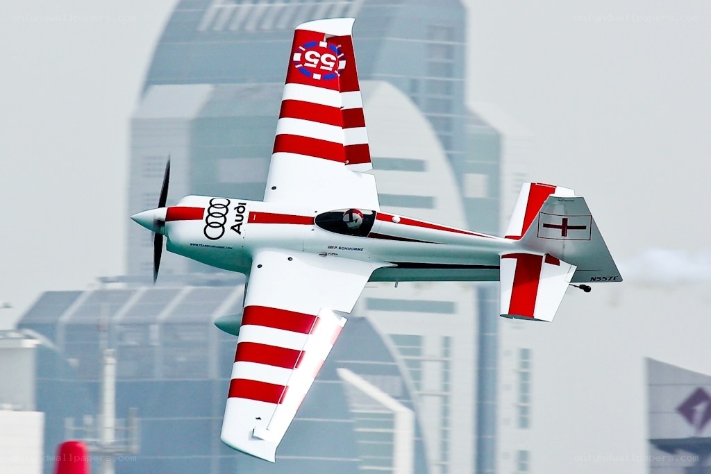 Audi-branded aerobatic plane in flight