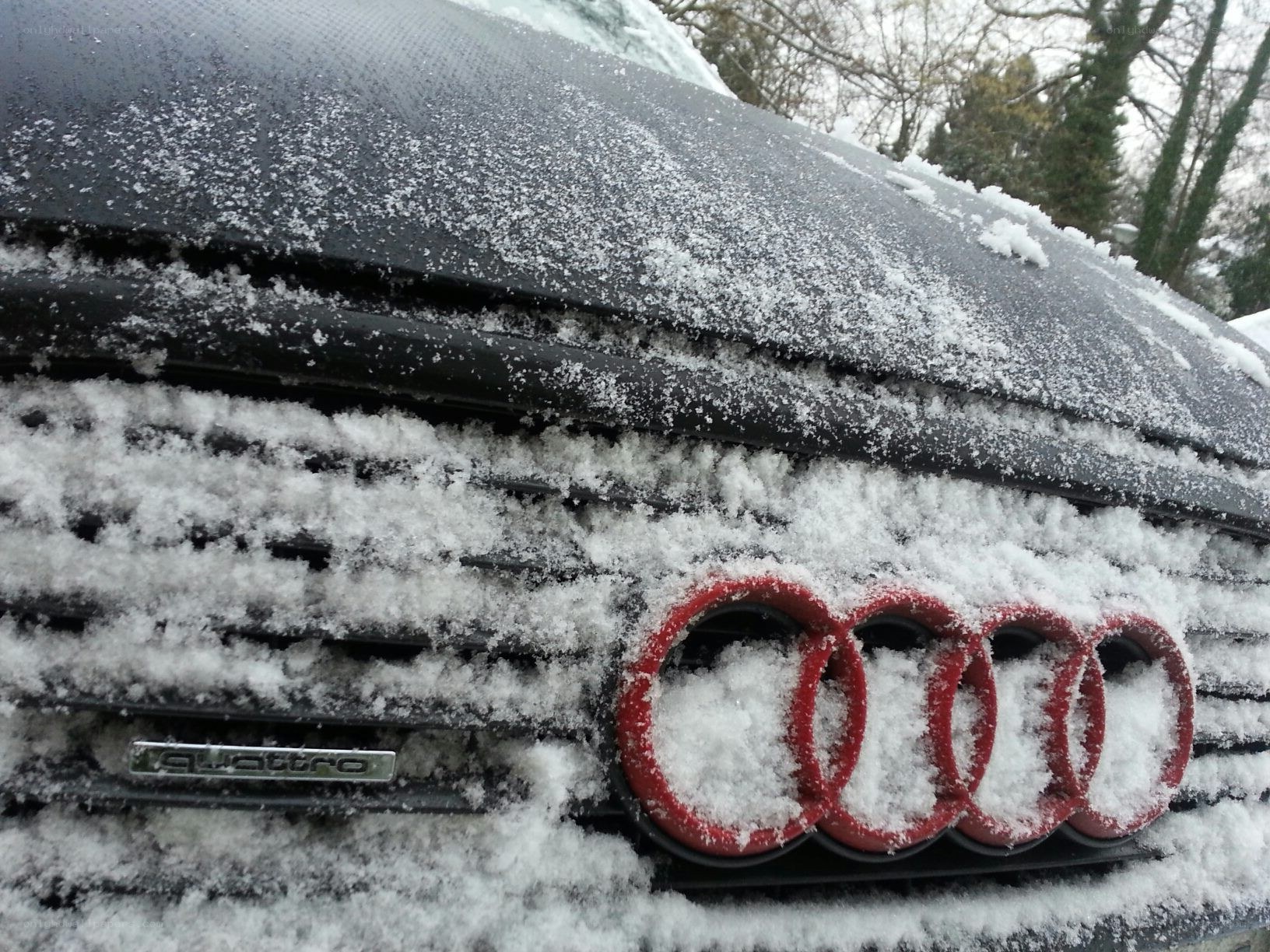 Audi car covered in snow