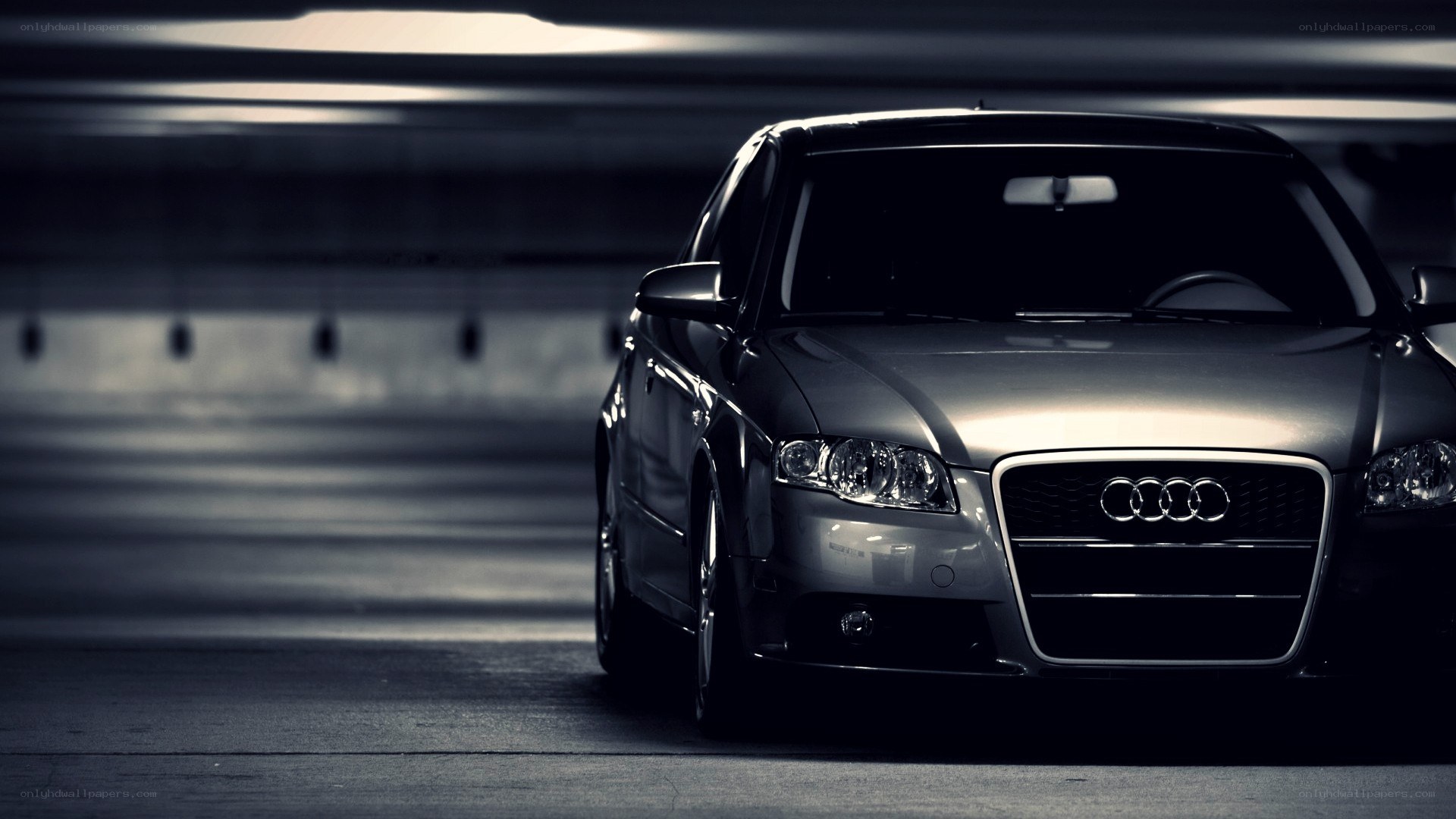 Audi car in a dark garage