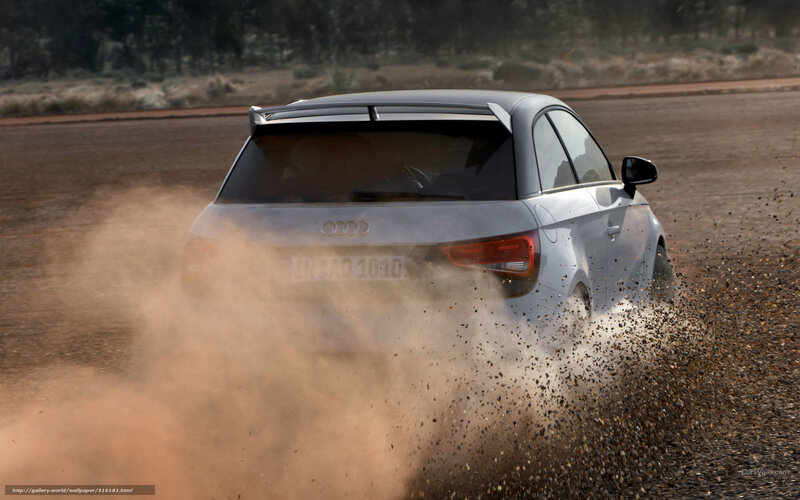 Audi car kicking up dust