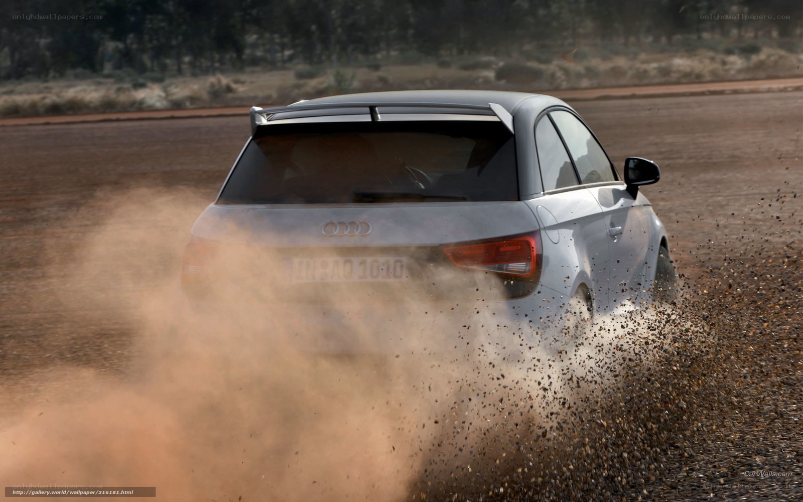 Audi car kicking up dust