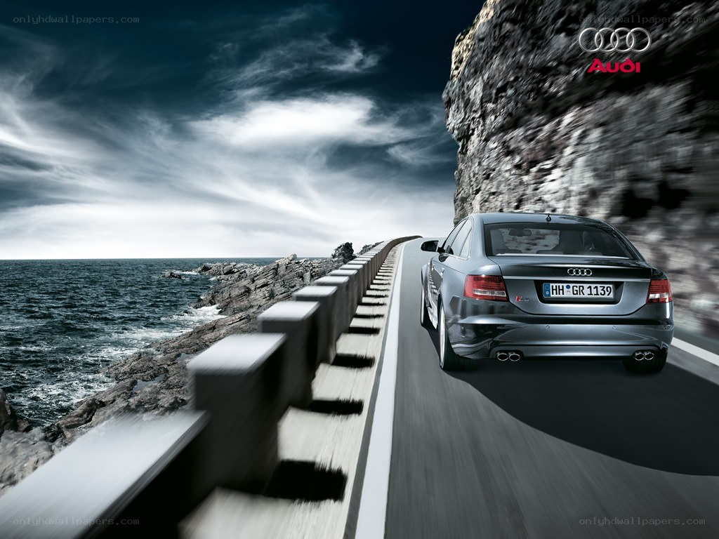 Audi car on coastal road