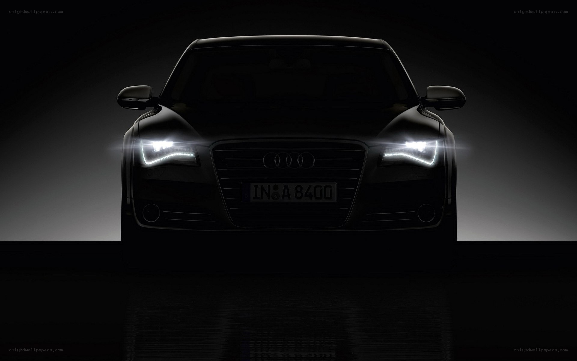 Audi car with headlights on