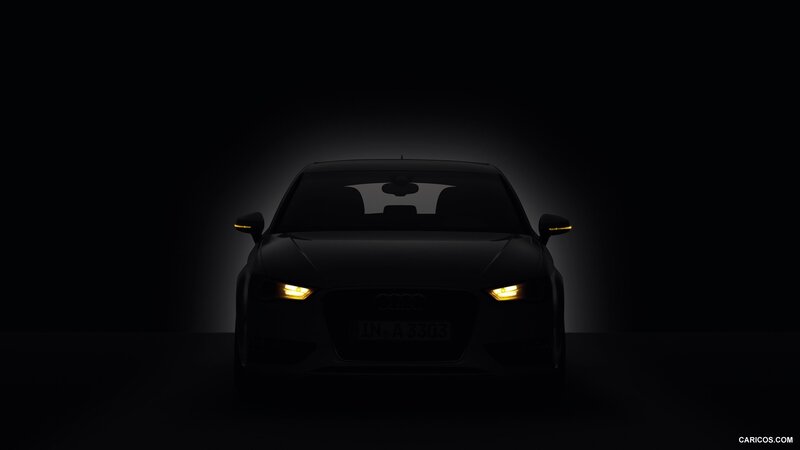 Audi car with headlights on