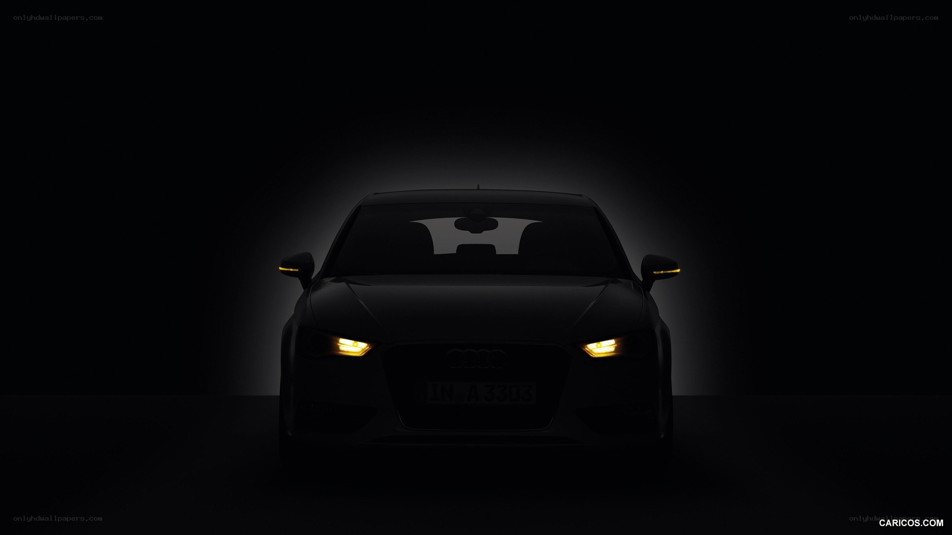 Audi car with headlights on