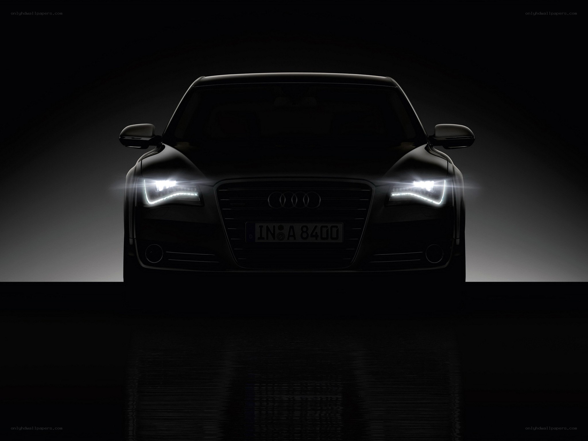 Audi car with headlights on