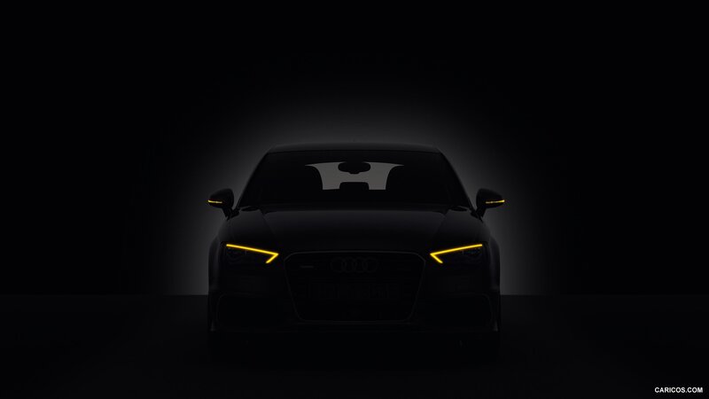 Audi car with illuminated headlights