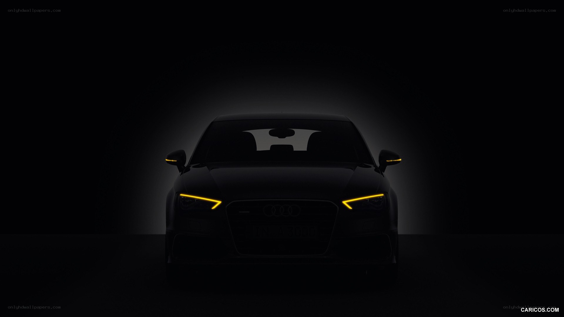 Audi car with illuminated headlights