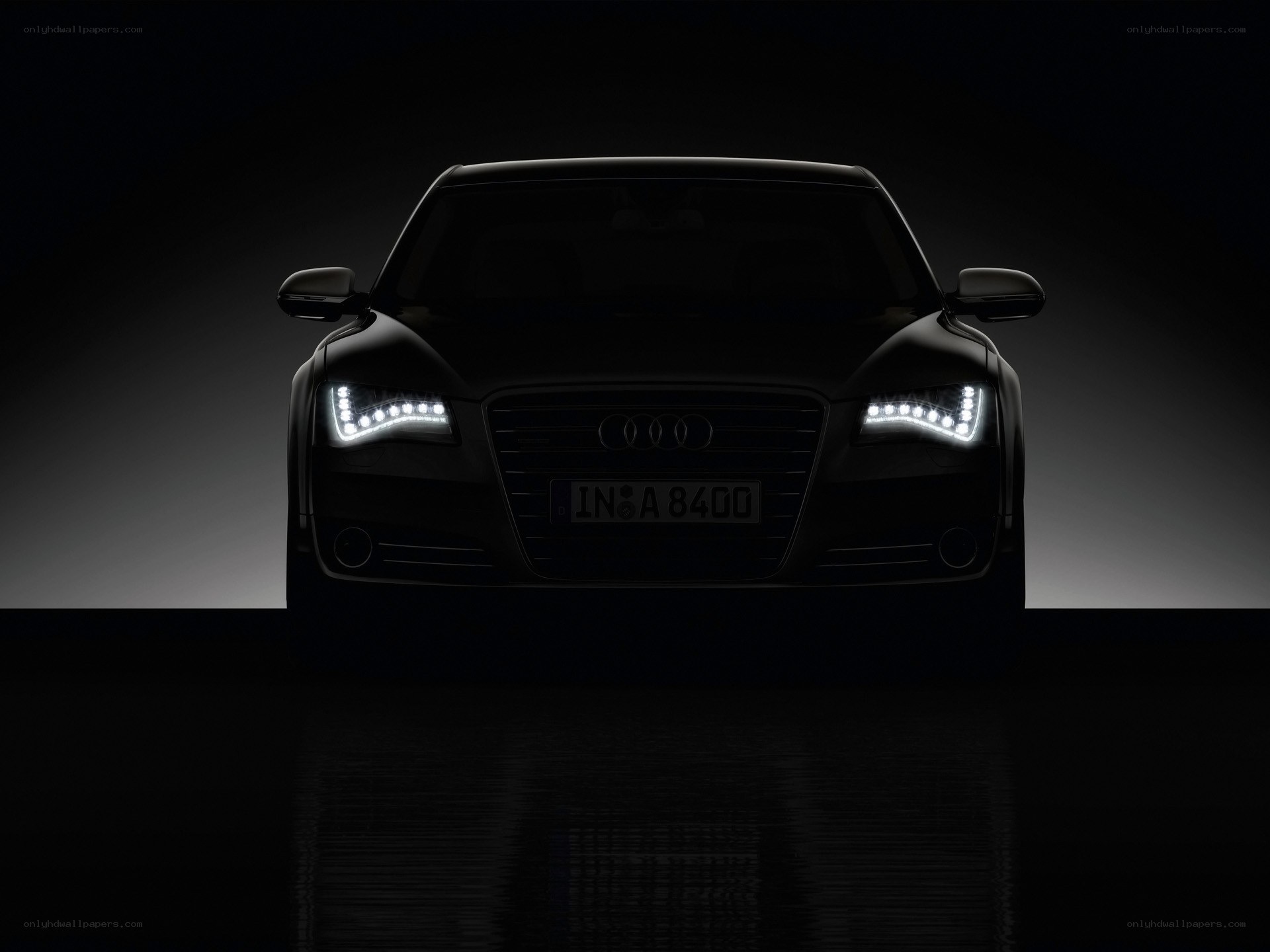 Audi car with illuminated headlights