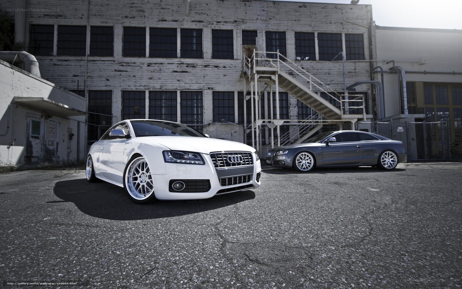 Audi cars in an industrial lot