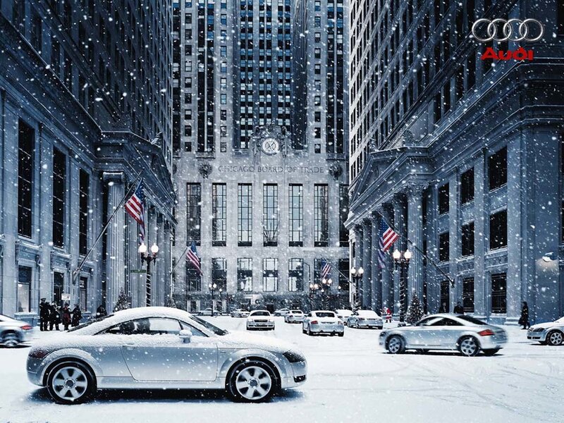 Audi cars in snowy city