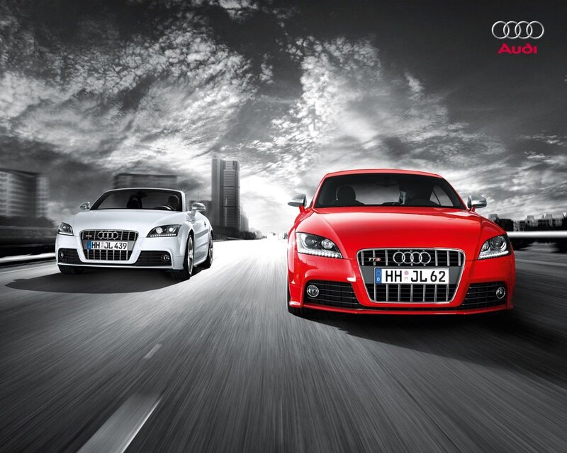 Audi cars on a city road