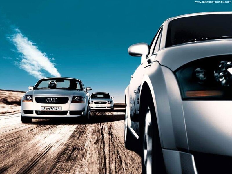 Audi cars on a desert road