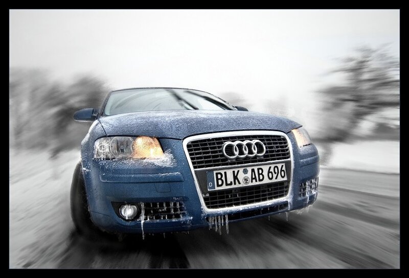Audi driving in snowy conditions