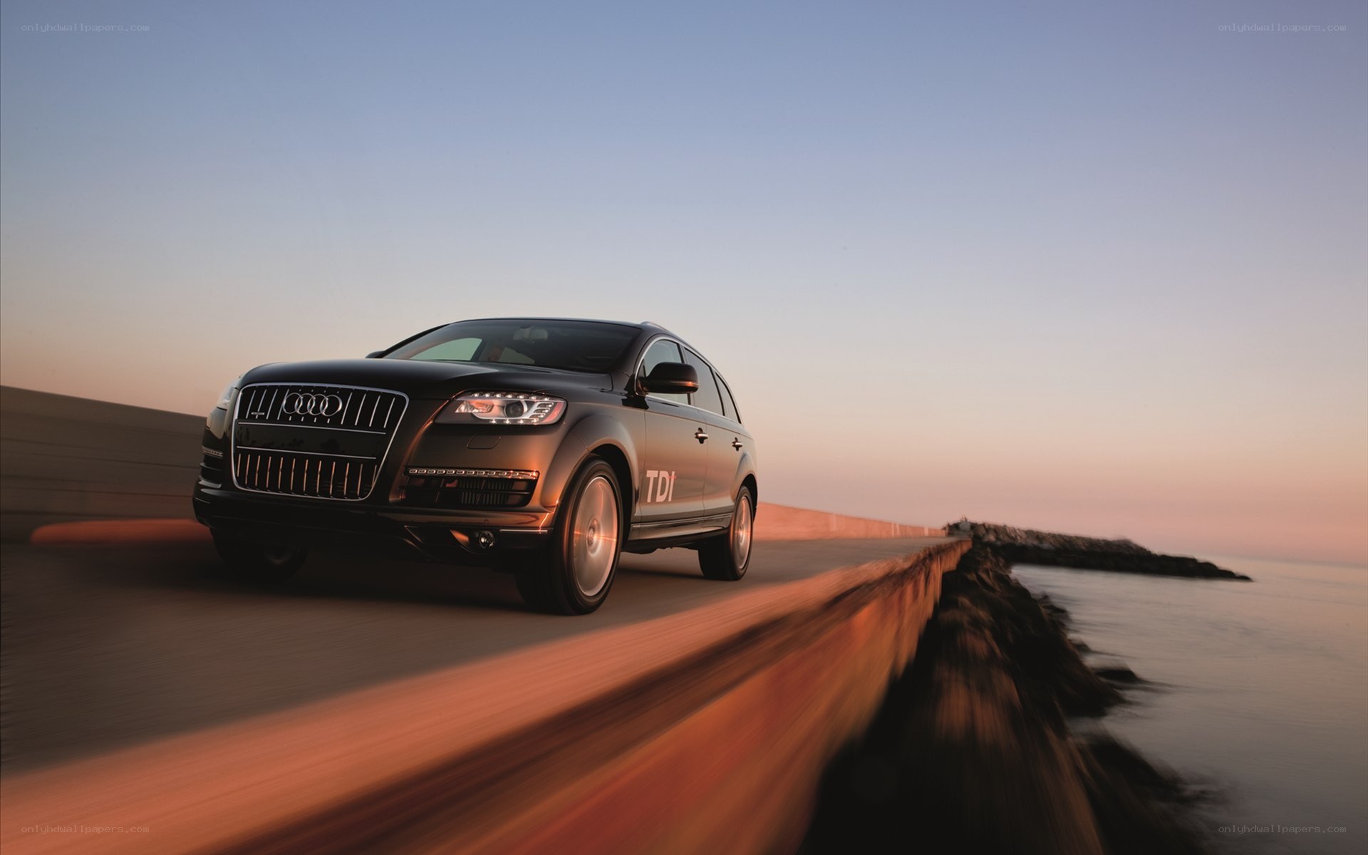 Audi driving on coastal road