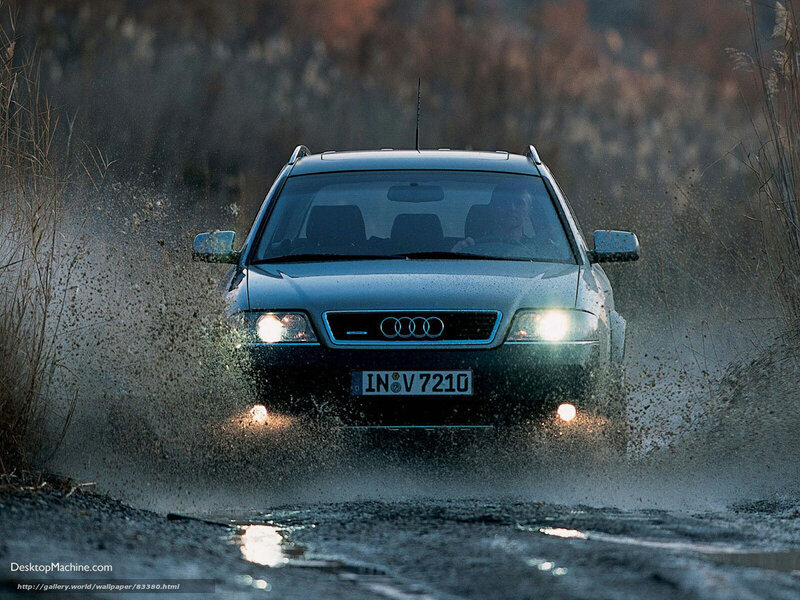 Audi driving through a puddle