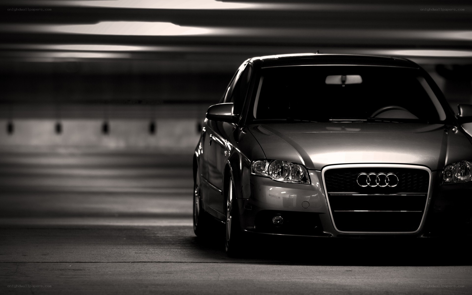 Audi in a dimly lit garage