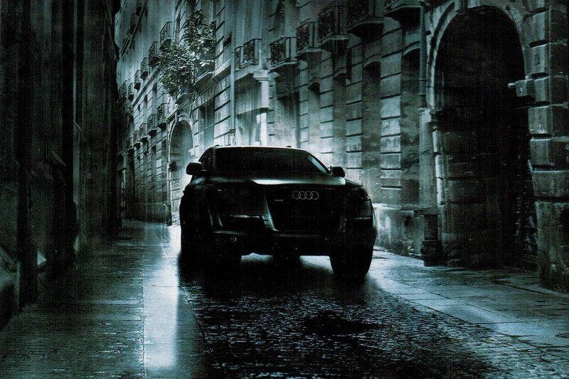 Audi in a rainy alley