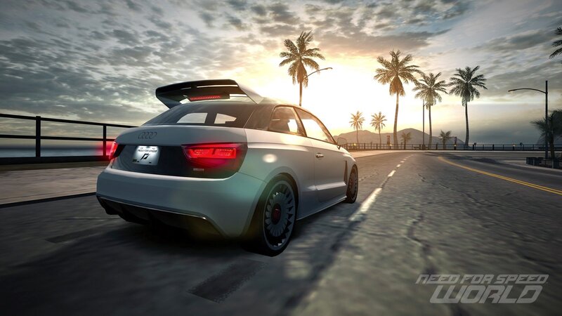 Audi on a coastal road at sunset