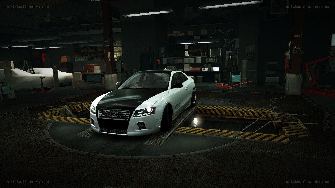 Audi on a turntable in a garage