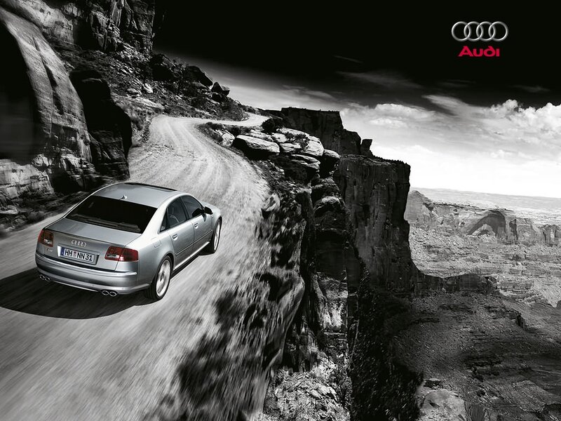 Audi on a winding canyon road