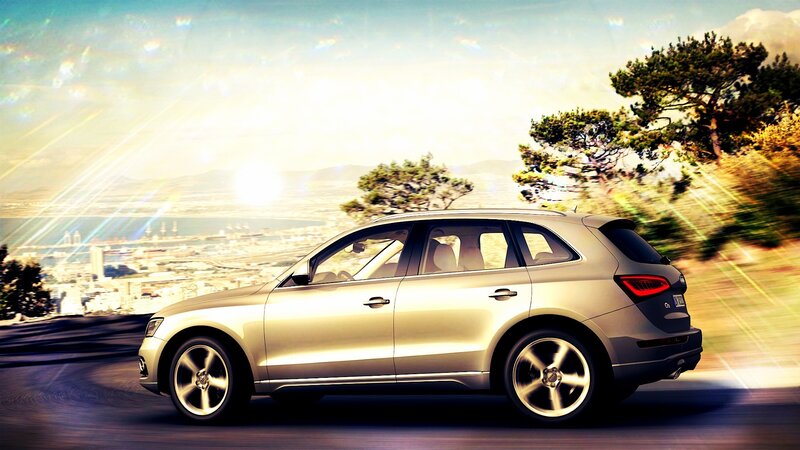 Audi Q5 driving on a scenic road