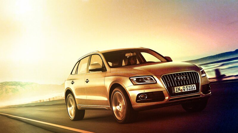 Audi Q5 driving on coastal road