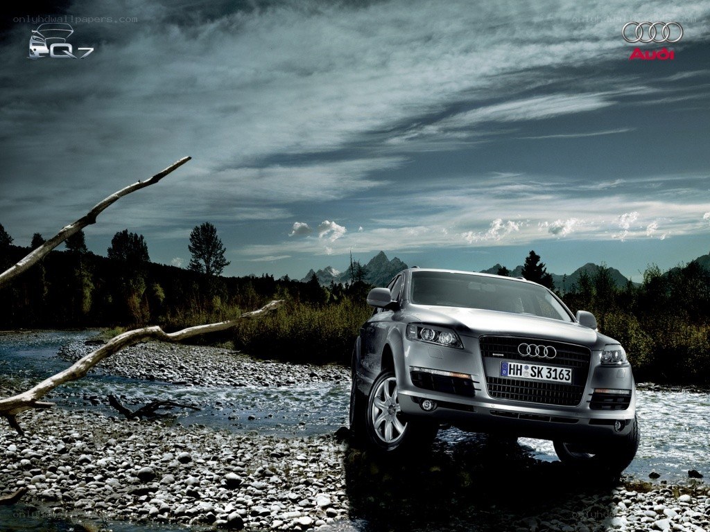 Audi Q7 in a river landscape