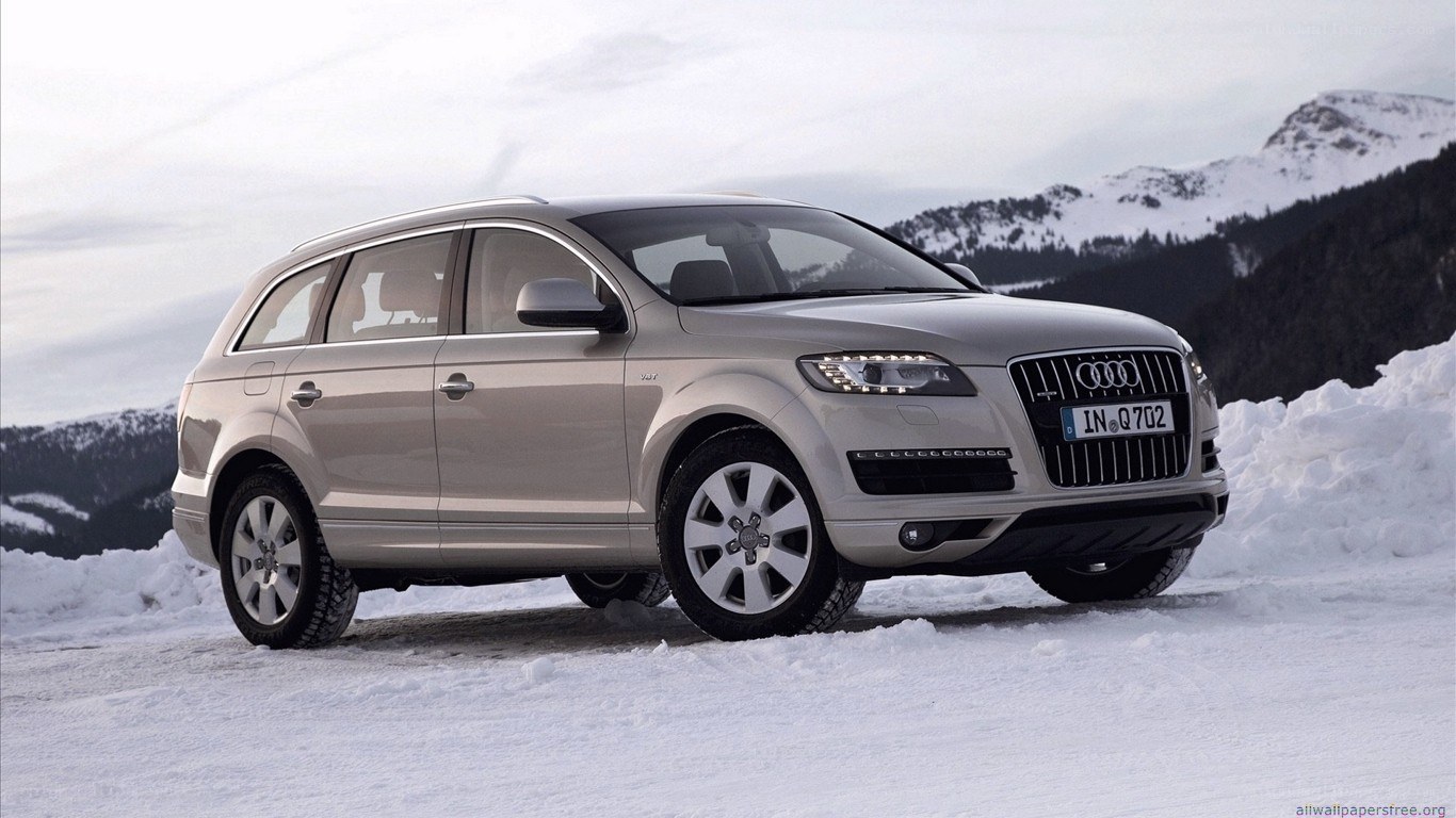 Audi Q7 in snowy mountains