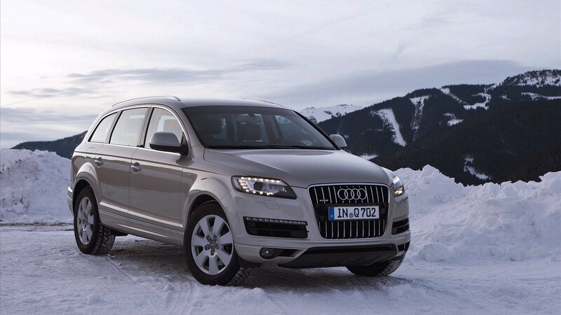 Audi Q7 in snowy mountains