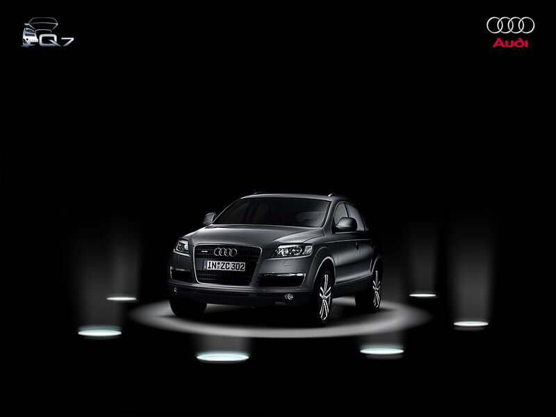 Audi Q7 on a dark stage