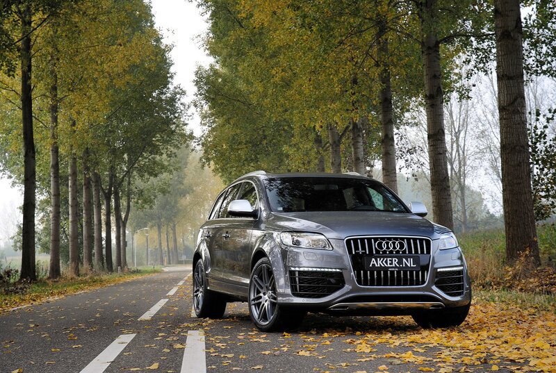 Audi Q7 on a tree-lined road