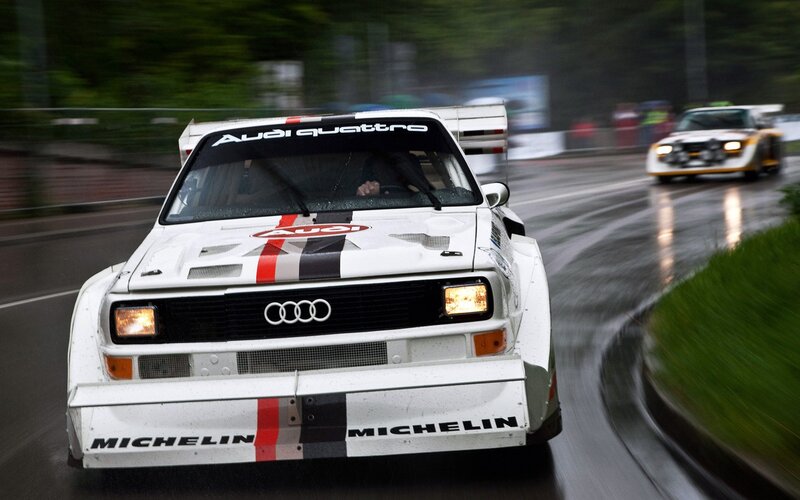 Audi quattro rally car on wet track