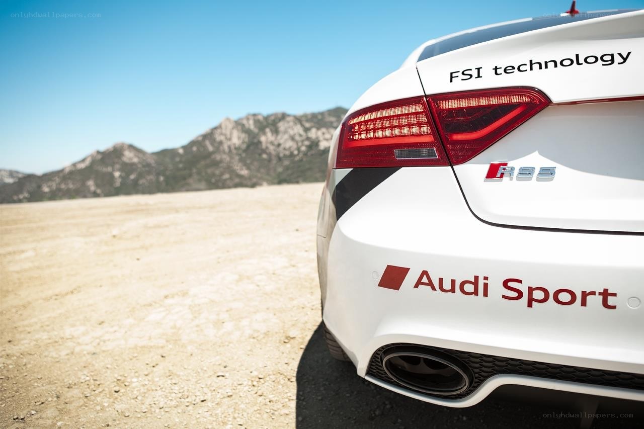 Audi R55 in desert landscape