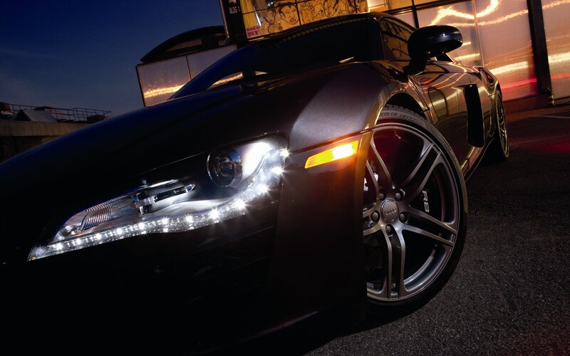 Audi R8 at night with headlights on