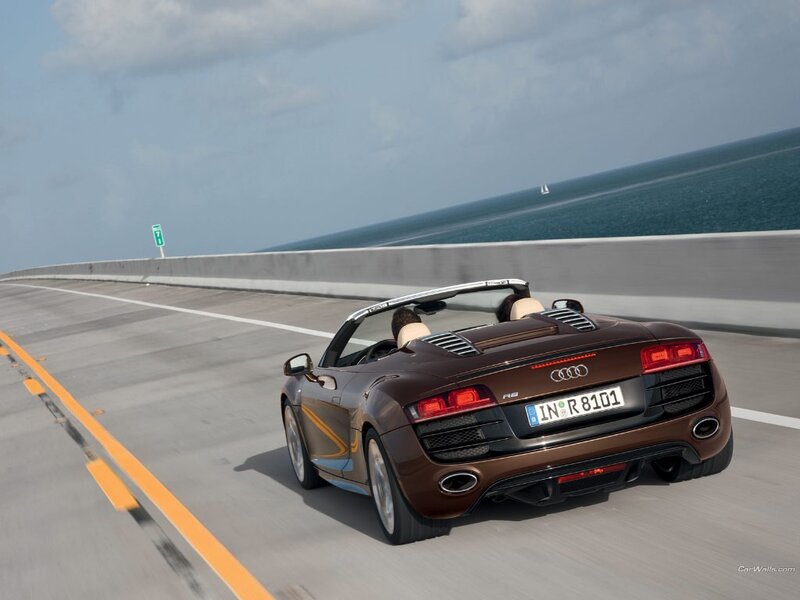 Audi R8 driving on a coastal road