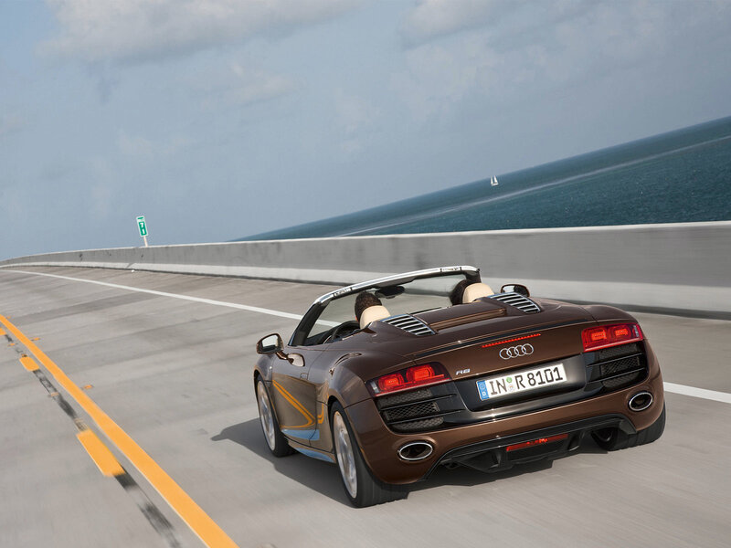 Audi R8 driving on coastal road