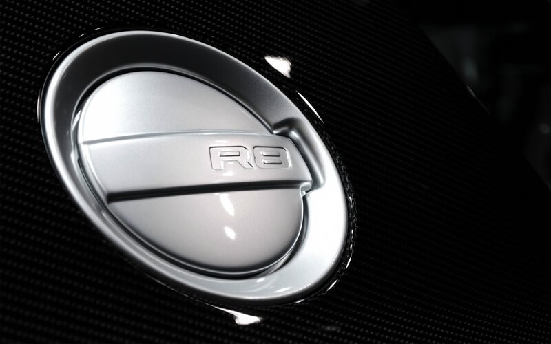 Audi R8 emblem on carbon fiber