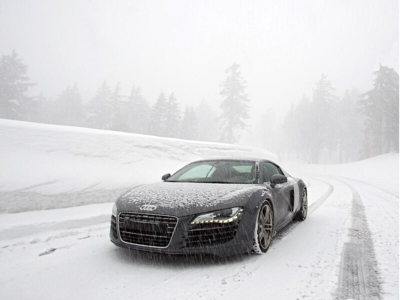 Audi R8 in a snowy forest
