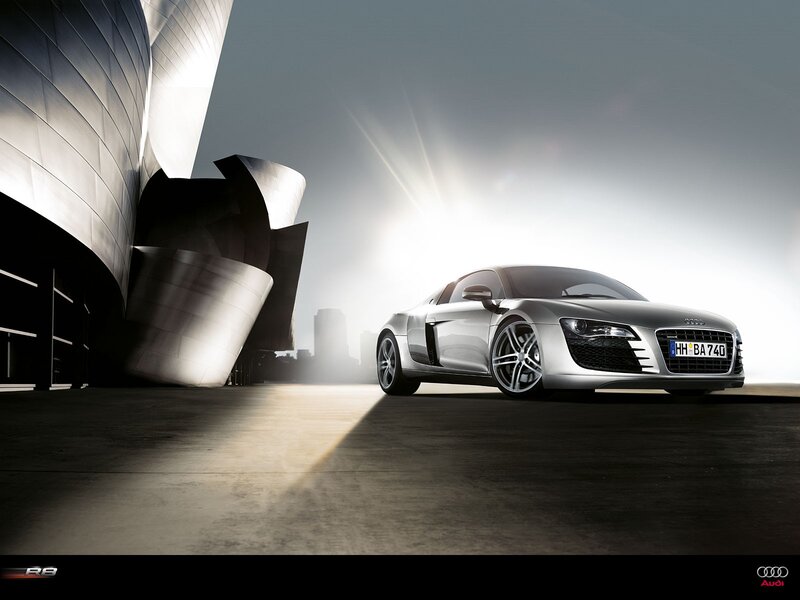 Audi R8 in front of modern building