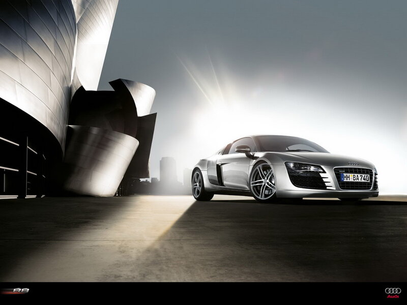 Audi R8 in front of modern building