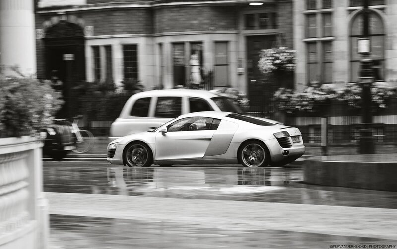 Audi R8 in motion on a wet street