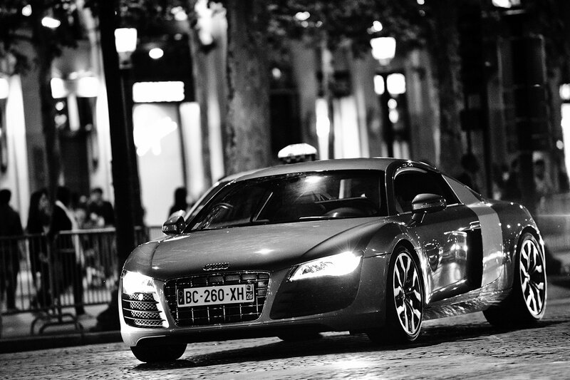 Audi R8 on a city street at night