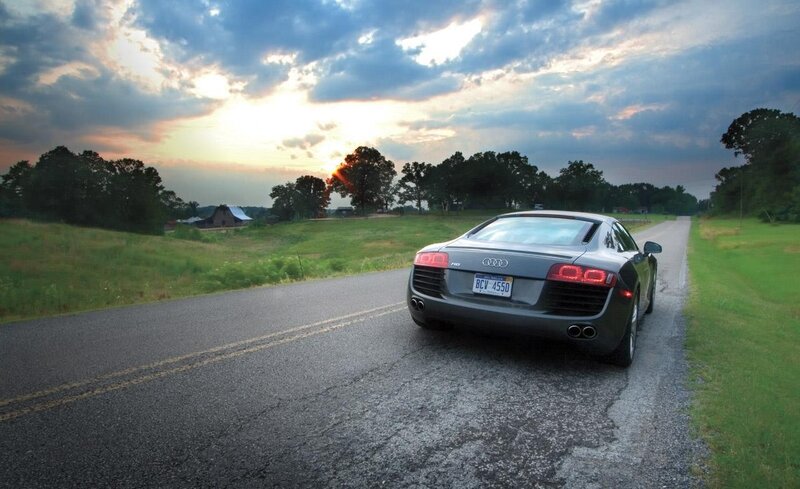 Audi R8 on a country road at sunset