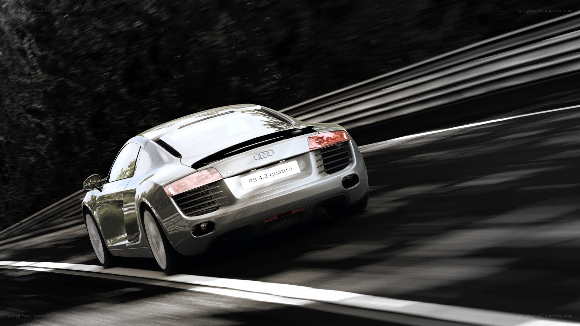 Audi R8 speeding on a road