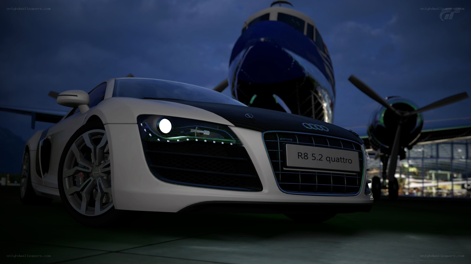 Audi R8 with airplane in background